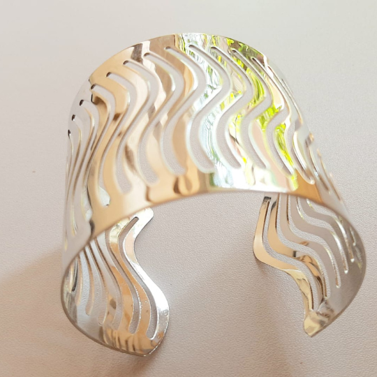 Patterned silver hand cuff